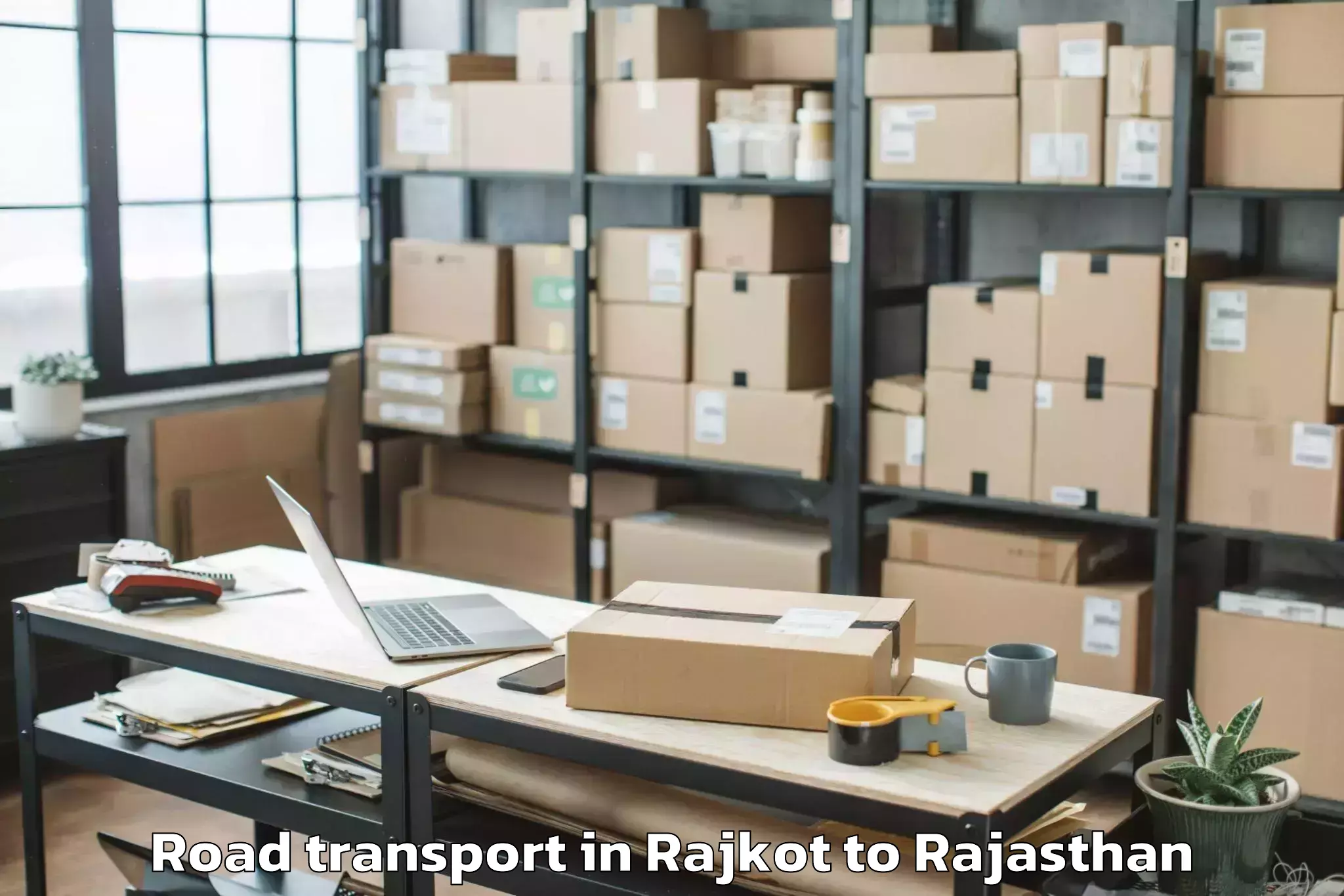 Book Rajkot to Basni Road Transport Online